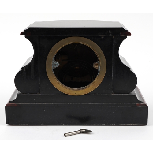 157 - Victorian black slate and red marble mantle clock striking on a gong with circular enamelled dial ha... 