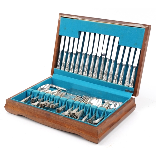 522 - Silver plated cutlery housed in a mahogany canteen, the knives engraved Black & Barlow Sheffield, 46... 