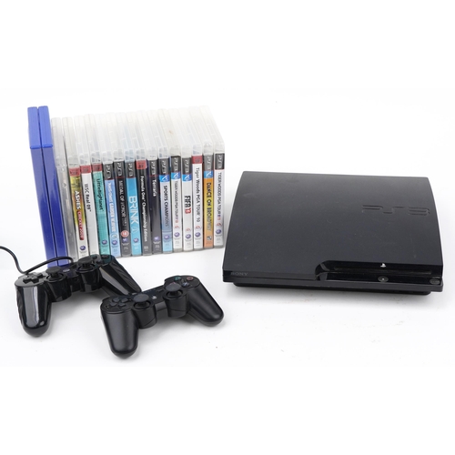 1504 - Sony PlayStation 3 games console with controllers and collection of games