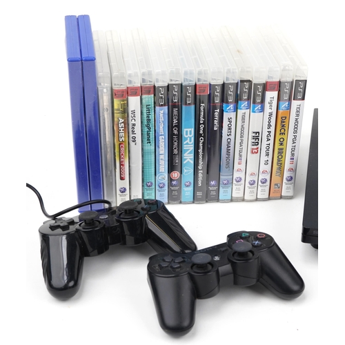 1504 - Sony PlayStation 3 games console with controllers and collection of games