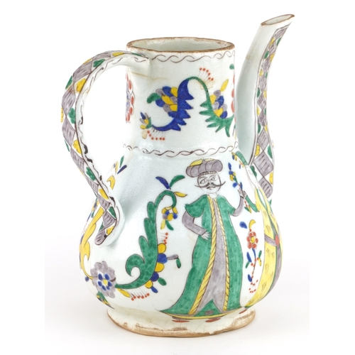 30 - Turkish Ottoman Kutahya pottery water jug hand painted with figures and stylised flowers, 19cm high