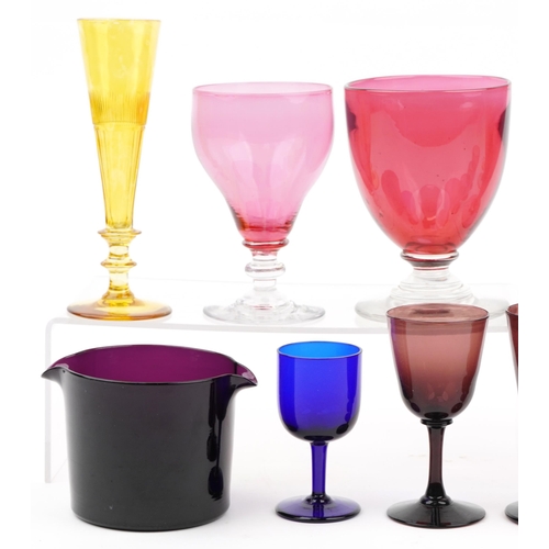 226 - 18th century and later glassware including cranberry ale glasses, pair of amber flutes and 
 purple ... 