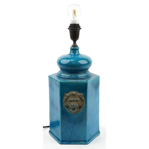 586 - Chinese style turquoise glazed hexagonal table lamp with lion masks, 50cm high