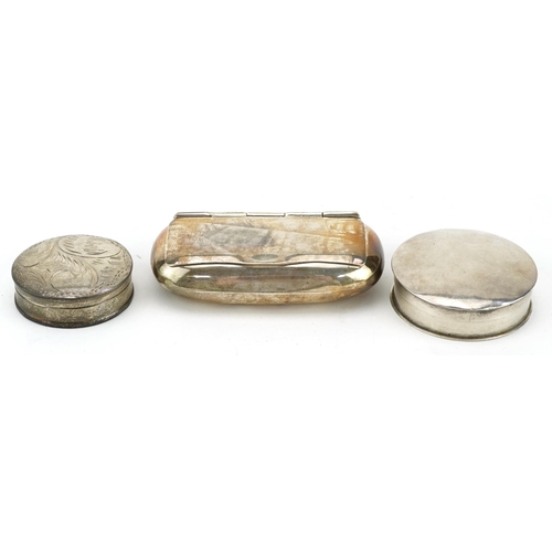 104 - Two circular silver pillboxes and a silver snuff box, the largest 6.5cm wide, total 58.2g