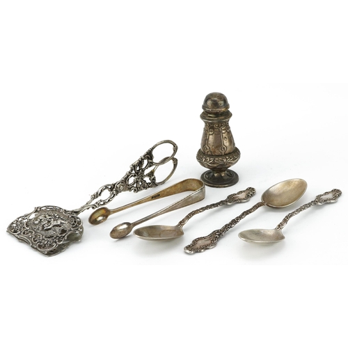 284 - Silver objects including a pair of Dutch 800 grade pastry tongs and a pair of sugar tongs, the large... 