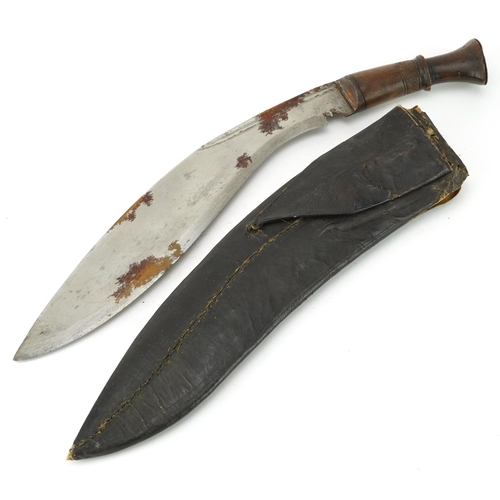 1560 - Gurkha's kukri knife with steel blade and leather sheath, 42cm in length