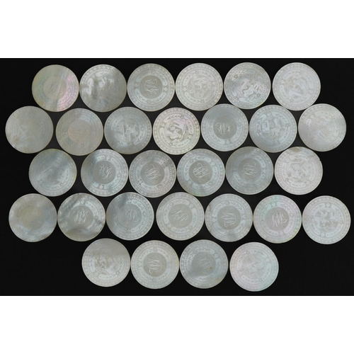 186 - Good collection of thirty Chinese Canton mother of pearl gaming counters carved with figures and flo... 