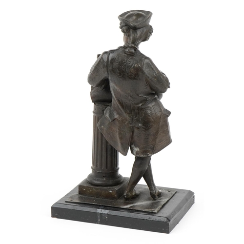 385 - Patinated spelter figure of a young musician leaning on a pillar raised on a rectangular ebonised bl... 