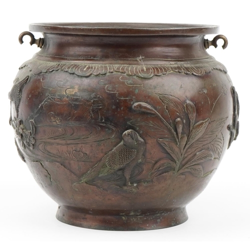 248 - Japanese patinated bronze jardiniere cast in relief with birds amongst flowers