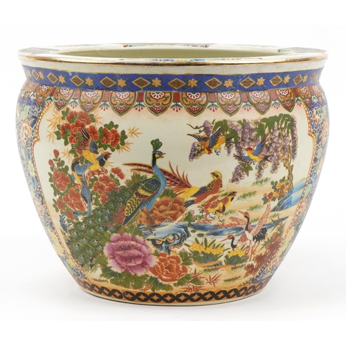 587 - Chinese porcelain jardiniere decorated with peacocks, flowers and fish, 28.5cm high x 37cm in diamet... 