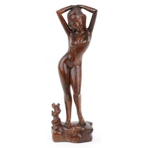 297 - Thai tribal interest rosewood carving of a standing nude female, 52.5cm high