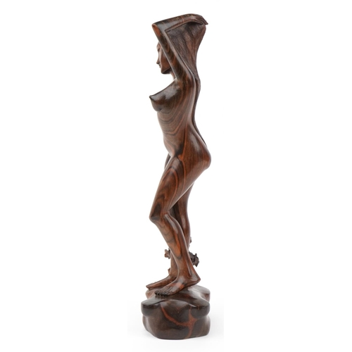 297 - Thai tribal interest rosewood carving of a standing nude female, 52.5cm high