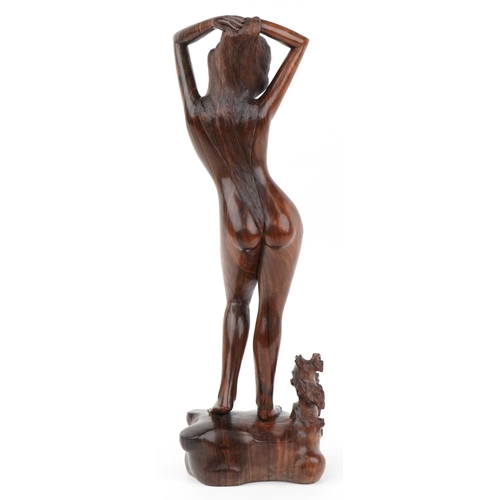 297 - Thai tribal interest rosewood carving of a standing nude female, 52.5cm high