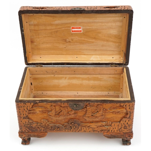 1034 - Chinese camphor wood table top chest carved with junks, 25cm H x 40cm W x 23cm D