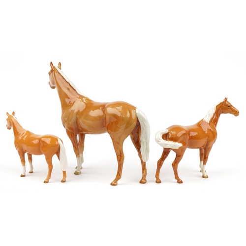 455 - Three graduated Beswick tan horses, the largest 35cm in length