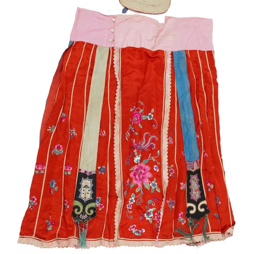 189 - Chinese Canton silk skirt embroidered with flowers and a silk hat embroidered with a toad, the large... 