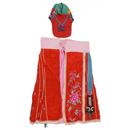 189 - Chinese Canton silk skirt embroidered with flowers and a silk hat embroidered with a toad, the large... 