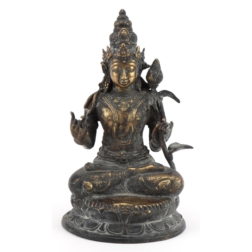 281 - Chino Tibetan patinated bronze figure of seated Buddha, 29cm high