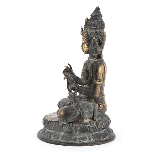 281 - Chino Tibetan patinated bronze figure of seated Buddha, 29cm high