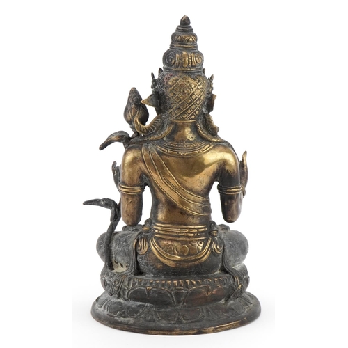 281 - Chino Tibetan patinated bronze figure of seated Buddha, 29cm high