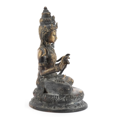 281 - Chino Tibetan patinated bronze figure of seated Buddha, 29cm high