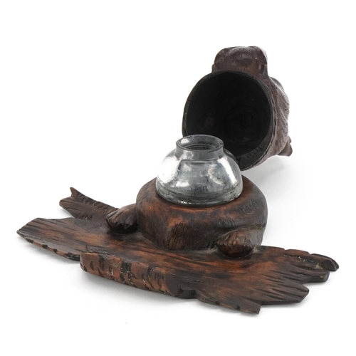 264 - German Black Forest carved wood inkwell with glass liner and pen rest in the form of a dog's head, 1... 