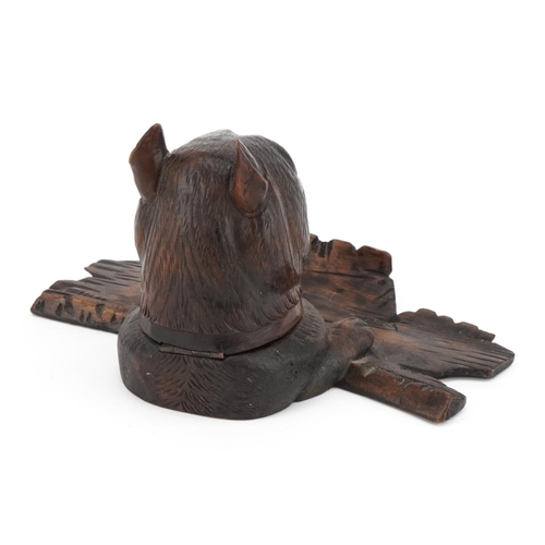 264 - German Black Forest carved wood inkwell with glass liner and pen rest in the form of a dog's head, 1... 