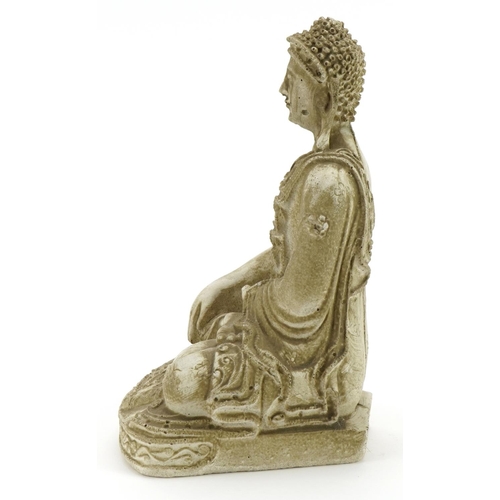 581 - Chinese plaster figure of a seated Buddha, 23.5cm high