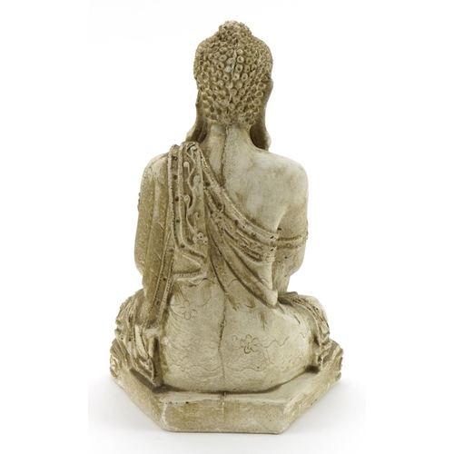 581 - Chinese plaster figure of a seated Buddha, 23.5cm high