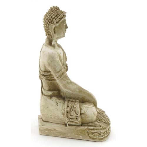 581 - Chinese plaster figure of a seated Buddha, 23.5cm high