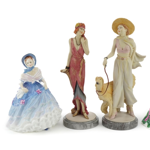 460 - Five Royal Doulton figurines including two Classique examples raised on circular bases