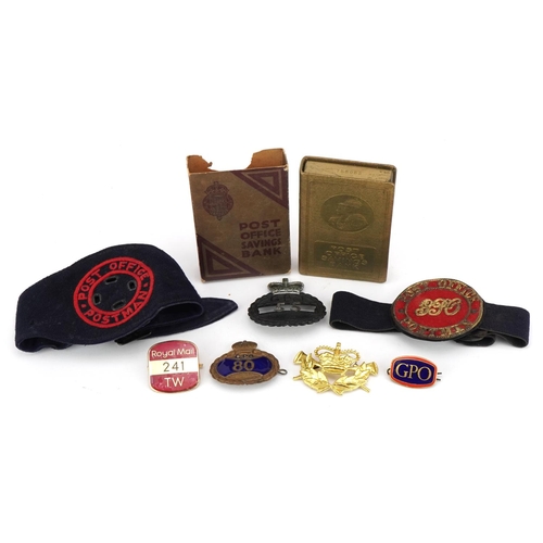 1537 - Post Office collectables including early postman armband, badges and Savings Bank