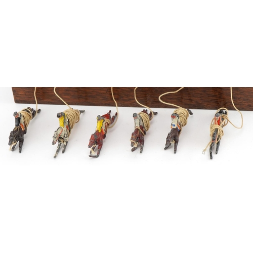 1472 - Oak cased Ascot new horseracing game with hand painted lead jockeys on horseback, 25cm wide