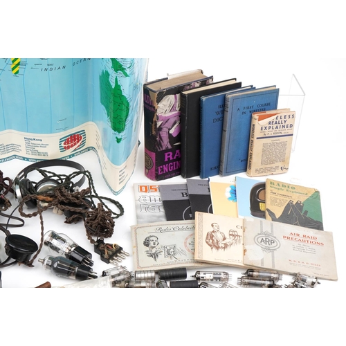 553 - Collection of vintage radio valves, headphones, books, magazines and a World Television Standards po... 