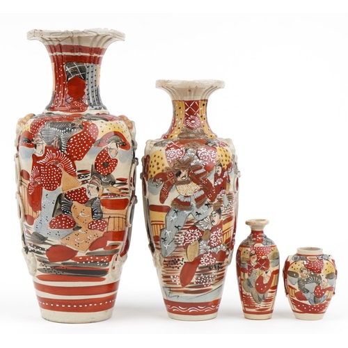 666 - Four Japanese Satsuma pottery vases hand painted with warriors, the largest 46cm high