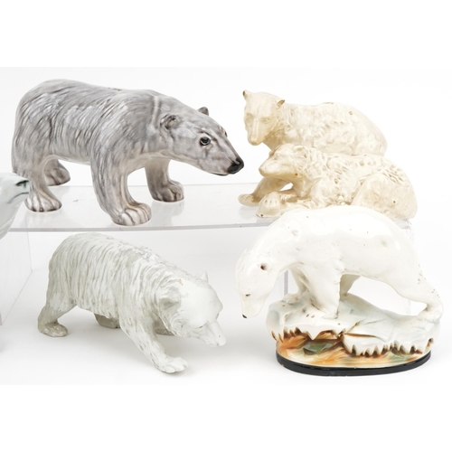 458 - Six Art Deco and later polar bear figures including a Czechoslovakian Royal Dux example, the largest... 