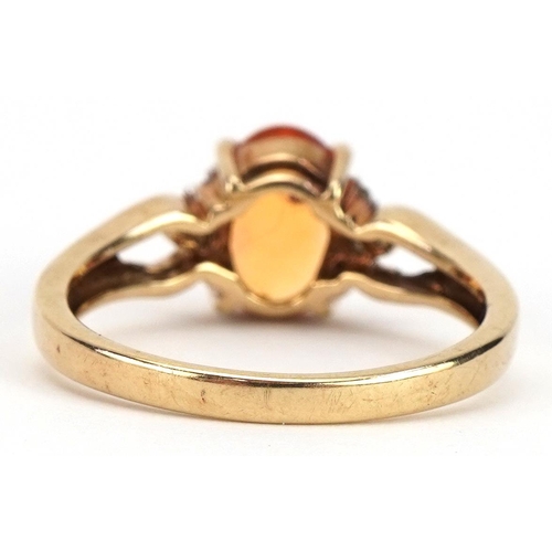 2295 - 9ct gold cabochon opal solitaire ring with diamond and citrine shoulders, the opal approximately 8.7... 