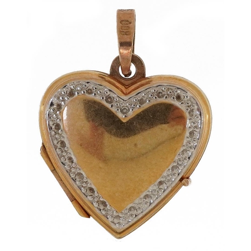 2162 - 9ct two tone gold love heart locket, 2.5cm high, 1.9g