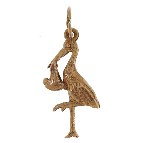 2252 - 9ct gold stork charm, 2.0cm high, 1.0g