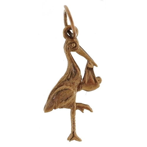 2252 - 9ct gold stork charm, 2.0cm high, 1.0g