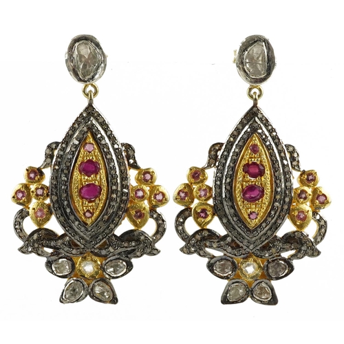 2324 - Pair of large Indian silver gilt diamond drop earrings set with rubies and garnets, 5cm high, 23.0g