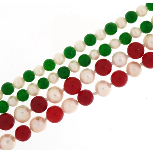 2396 - Two single strand pearl bead necklaces including one green jade example, total 154.1g