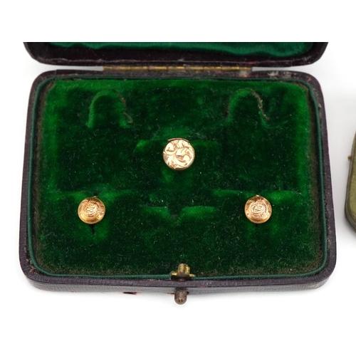 2386 - Set of six yellow metal enamel and mother of pearl buttons and three yellow metal studs, both with f... 