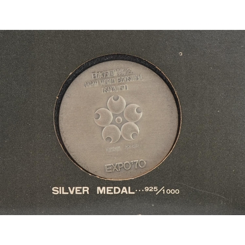 1598 - Three silver medallions with fitted cases comprising Rugby World Cup Supporters medal, Pan World Exp... 