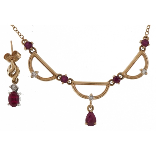 2116 - 9ct gold ruby and diamond teardrop necklace and one similar drop earring, the necklace 39cm in lengt... 