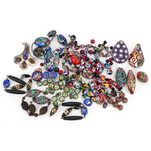 2284 - Collection of Venetian millefiori glass beads and pendants, the largest bead approximately 4.3cm hig... 