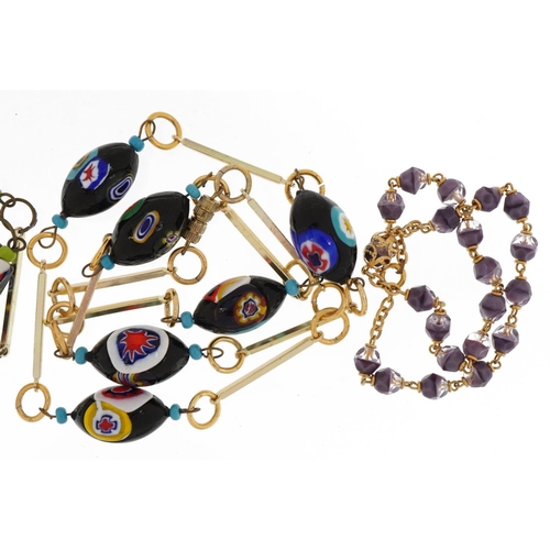 2300 - Two Venetian glass millefiori bead necklaces and a purple glass bead choker with yellow metal clasp