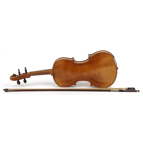 409 - Old wooden violin with bow and protective case, the violin back impressed Klotz and 14 inches in len... 