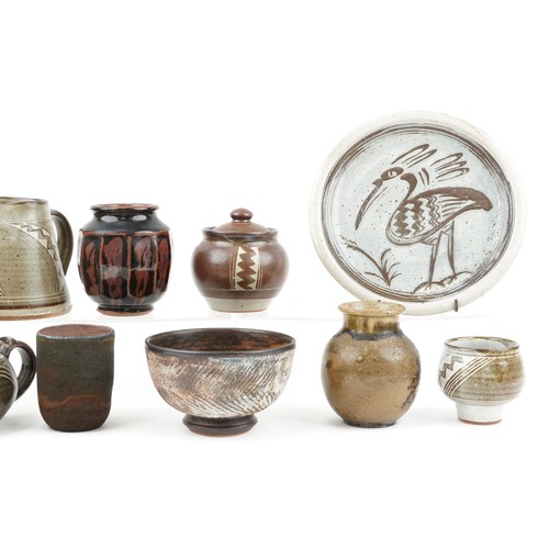 251 - Studio pottery including a plate hand painted with stylised bird in the manner of Bernard Leach, tea... 