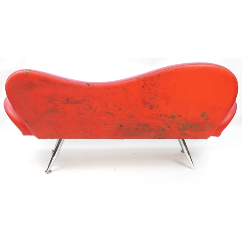 1047 - Red faux leather lips design salon settee raised on chrome legs, 180cm wide